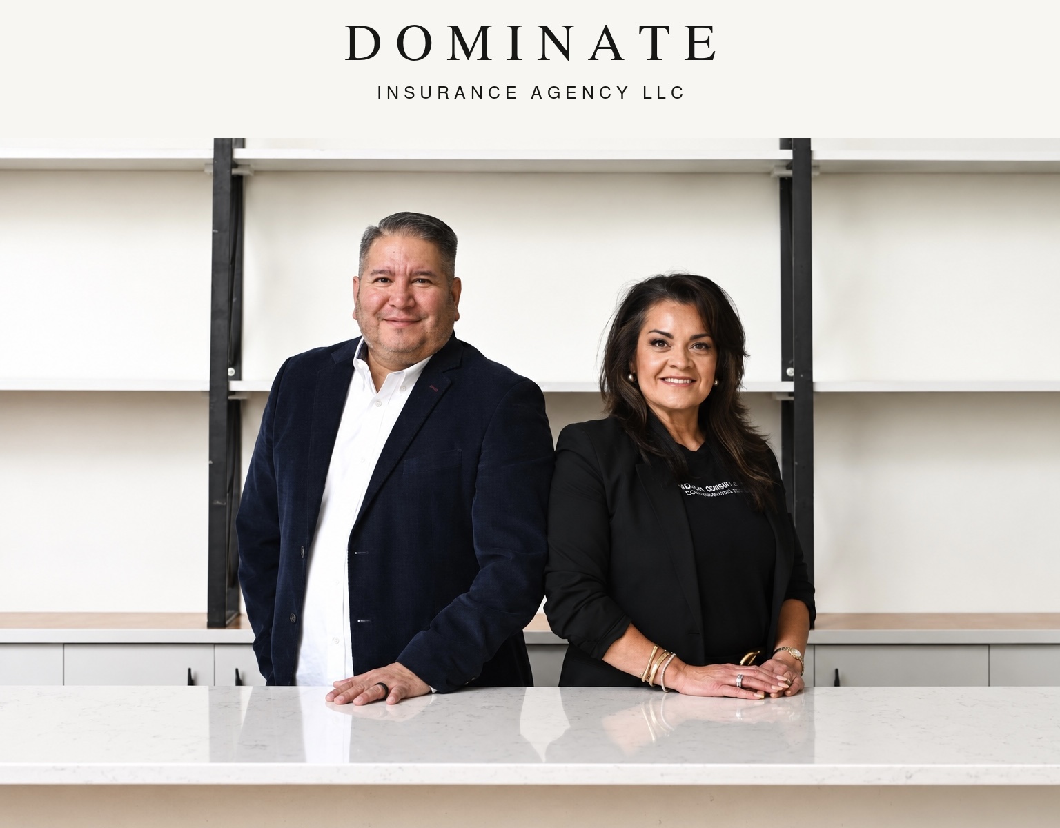 The Dominate Insurance Agency LLC family team in their office